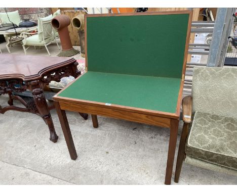 A FOLDING TEAK CARD TABLE 