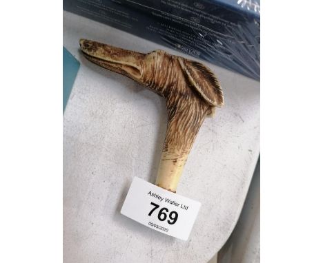 A CARVED BONE STYLE DOGS HEAD WALKING STICK TOP 