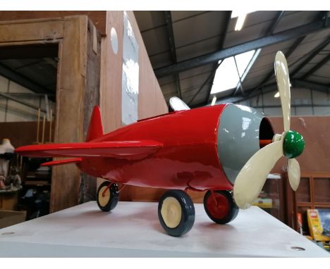 A VINTAGE STYLE TIN PLATE MODEL OF AN AEROPLANE 