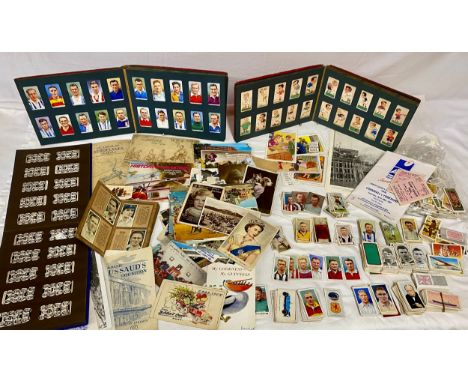 A large quantity of cigarette cards to include Wills, Player's, famous footballers Carreras, Ogden's, Barratt &amp; Co, Mobil