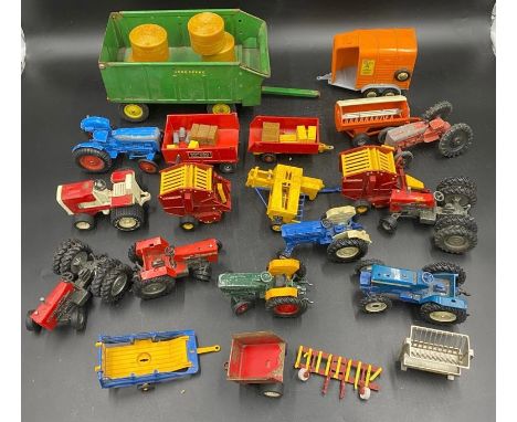 A collection of Britains diecast toys to include Vermeer Round Baler x 2, MF200 Massey Ferguson Trailer, Beaufort Double Hors