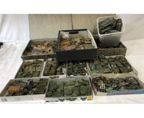 A very large quantity of Army toys to include model soldiers, tanks (some camouflaged), trucks etc.