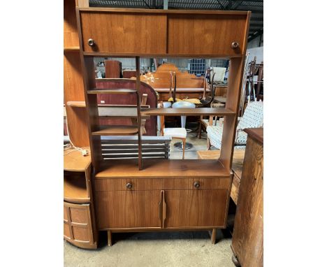 A mid century teak shelf unit. 107 w x 31 d x 177cm h. Some stains and scratches. Hole in back for cables.