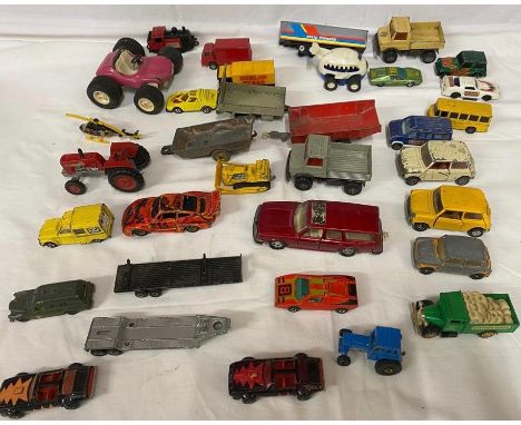 A collection of diecast toys to include Dinky trailer, Matchbox Super Kings trailer, Corgi British Leyland Mini 1000 x 2, Cor