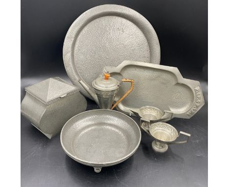 A selection of hammered English pewter to include a Howard bowl on four feet 21cm diameter, Craftsman lidded pot a coffee pot