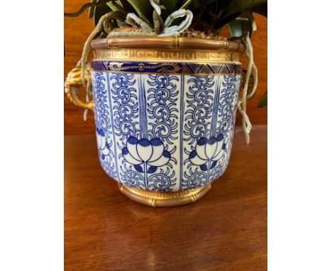 A 19thC blue and white Royal Worcester jardinière with gilt elephant handles. 19cm h.Condition ReportGilt rub to handles.