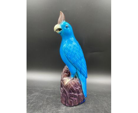 A ceramic blue parrot 30cm h.