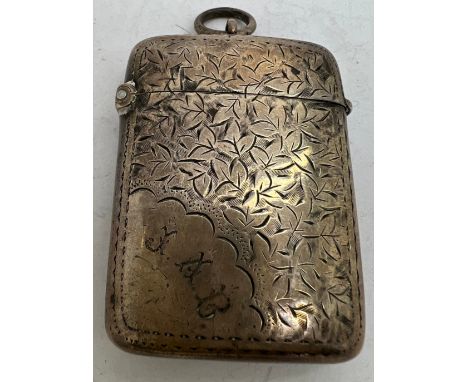 A hallmarked silver foliate engraved vesta case. Birmingham 1898 maker J R Ltd, initialled to front J.A.B. on suspension ring