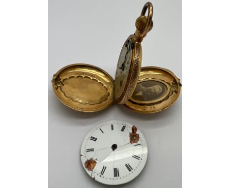 A 14ct gold cased pocket watch with portrait to interior. Total weight 32.8gm.Condition ReportA/f.