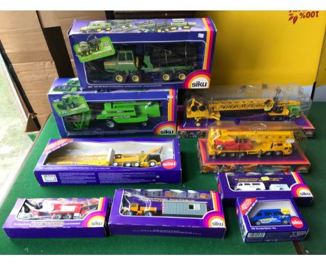 Siku model vehicles, boxed, 3950 Combine Harvester, 3913 Tractor Truck with Crane, 4010 Hydraulic Crane Truck, 3852 Master Fo
