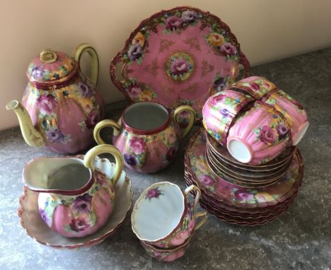 China tea service, comprising large handled plate 25cm w, 6 cups and saucers, 6 side plates 18.5cm w, milk jug, teapot 21cm h
