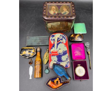 A miscellany to include vintage tins, Columbus Watch Co pocket watch and box, snuff box, glass scent bottles, novelty pipe as