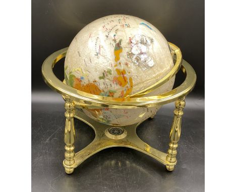 Mother of Pearl &amp; Gemstone globe on brass stand. 44cm h.Condition ReportGood condition.