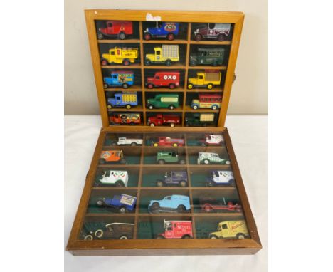 Two glazed cases of 30 various vans etc to include Lledo, Days Gone, Corgi and Matchbox.Condition ReportMajority in good cond