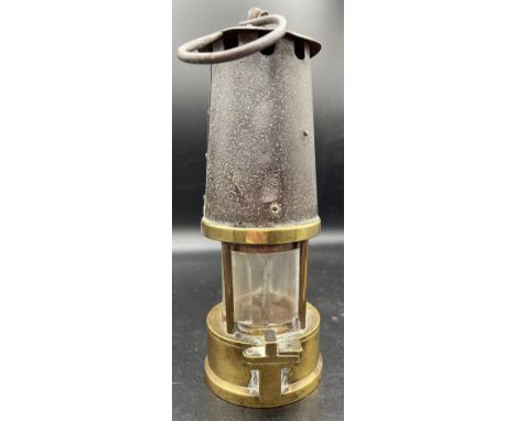 A Prestwich patent miners safety lamp. 23cm h.