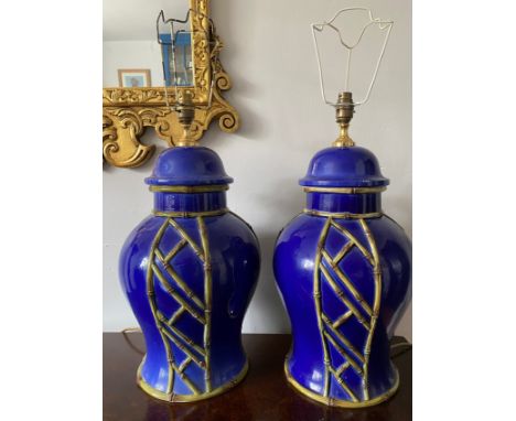 A pair of large blue contemporary ceramic tables lamps with bamboo relief detail. 52cm to top of fitting and 21.5cm base diam