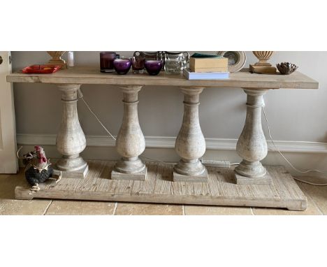 Wooden console table with half baluster supports. 180 l x 40 d x 80cm h.Condition ReportGood condition.