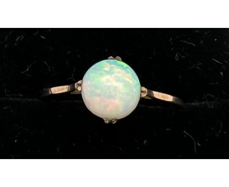 A 9ct gold ring set with opal. Size Q/R. Weight 1.4gm.