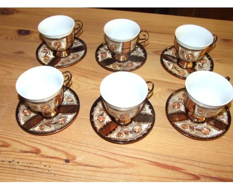 6 Copper Cups ( with ceramic liner ) and Saucers &amp; 4 Brass Camels
