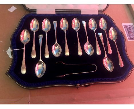 Cased silver teaspoon set of 12 spoons with matching tongs in case.  John Sanderson 1913.