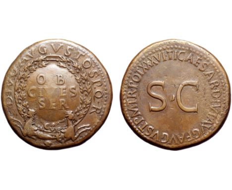 Divus Augustus Æ Sestertius. Rome, AD 34-35. DIVO•AVGVSTO•S•P•Q•R, shield within wreath inscribed OB CIVES SER supported by t