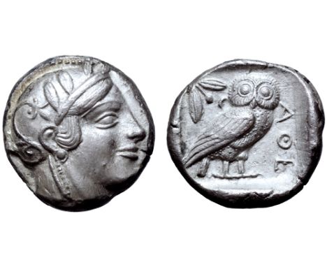 Attica, Athens AR Tetradrachm. Circa 465-454 BC. Head of Athena right, wearing earring, necklace, and crested Attic helmet de