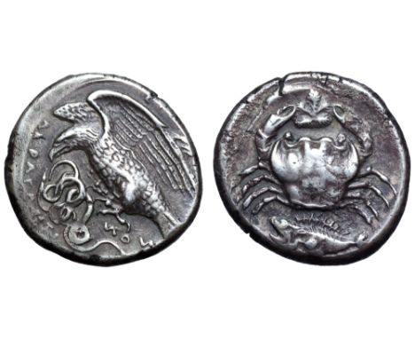 Sicily, Akragas AR Didrachm. Circa 413-406 BC. Eagle standing left, with its wings spread, attacking a coiled serpent held in