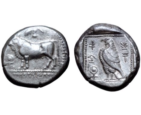 Cyprus, Paphos AR Stater. Onasioikos, circa 450-440 BC. Bull standing left on beaded double line; winged solar disk above, an