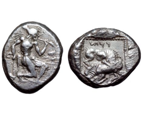 Cilicia, uncertain mint AR Stater. 5th century BC. Amazon(?) running right, bow in case on far hip, holding branch (?) over s