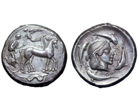 Sicily, Syracuse AR Tetradrachm. Deinomenid Tyranny. Time of Hieron I, circa 470-466 BC. Charioteer, holding kentron and rein
