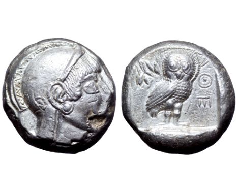 Attica, Athens AR Tetradrachm. Circa 490-482 BC. Archaic head of Athena right wearing crested helmet decorated with chevron a