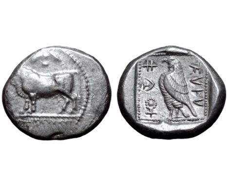 Cyprus, Paphos AR Stater. Stasandros, circa 440-425 BC. Bull standing left on beaded double line; winged solar disk above, [a