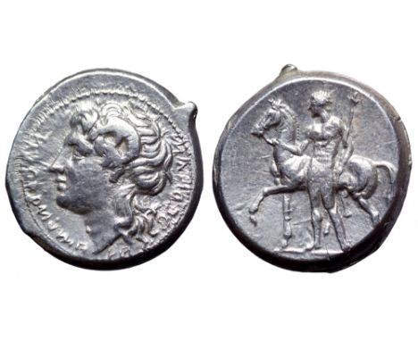 Campania, Nuceria Alfaterna AR Didrachm. Circa 250-225 BC. Head of Apollo Karneios left with horn of Ammon; Oscan legend ‘nuv