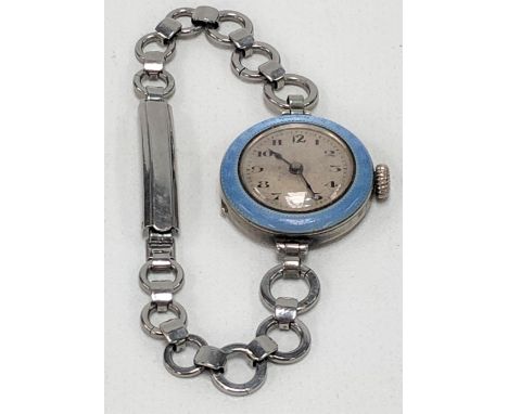 Early 20th Century white metal and blue guilloche enamel cased ladies manual wind cocktail wristwatch, with 13mm silvered dia
