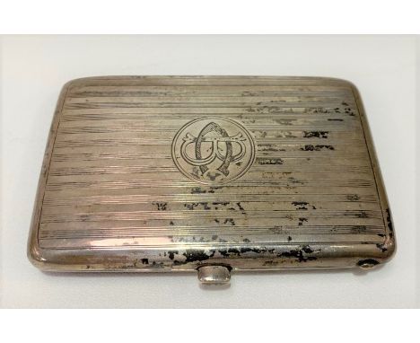 A George V silver engine turned three-section stamp and card case by Charles S. Green &amp; Co, Birmingham 1914, with engrave