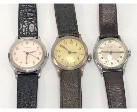 Three vintage gentlemans manual wind wristwatches, one by Garrard, the other by Bentina, the other unsigned