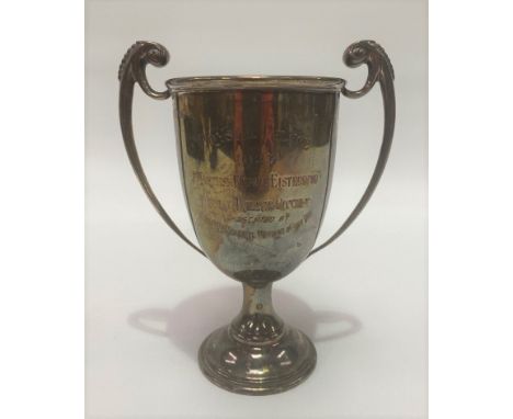 A George V silver twin handled pedestal trophy cup, with engraved decoration, London 1923, height 16cm, weight 7.35oz approx.