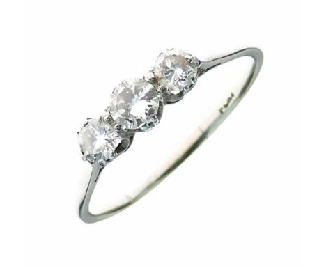 Three stone diamond ring, the white mount stamped 'Plat', the graduated brilliant cuts totalling approximately 0.7 carats, si