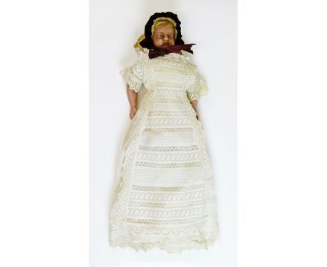 19th Century wax head doll, probably English, having blonde hair and blue eyes, conforming wax limbs and stuffed torso, no ma