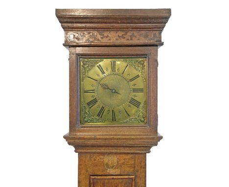 Early 18th Century oak longcase clock by Simon Thorne of Tiverton, the hood with moulded cornice, square glass door, trunk wi