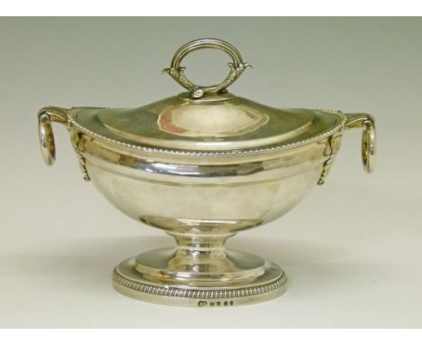 George III oval silver sauce tureen and cover by Paul Storr, the cover having an oval handle, the base with oval ring drop ha