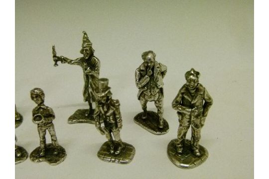 small silver figurines