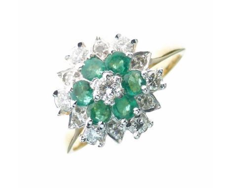 Diamond and emerald cluster ring, stamped '18ct', set with seven brilliant cuts, totalling approximately 0.32 carats, and six