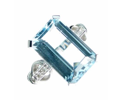 Aquamarine and diamond ring, stamped '18ct', the step cut aquamarine measuring 15mm x 10mm x 6.8mm deep, flanked either side 