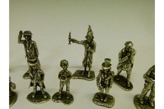 small silver figurines