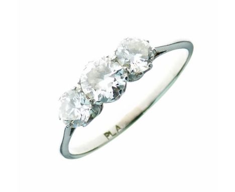 Three stone diamond ring, the white mount stamped 'Pla', the graduated brilliant cuts totalling approximately 1.3 carats, siz