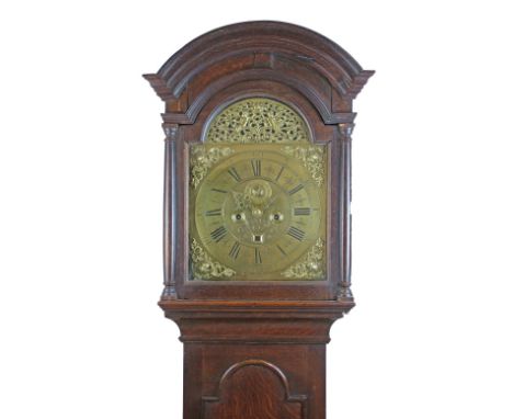 Antique oak longcase clock signed Thomas Bridge, London, the hood with moulded cornice, arch shaped glazed door flanked by cy