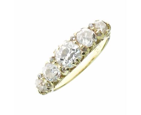 Late Victorian five stone diamond ring, stamped '18ct', the graduated old cuts totalling approximately 1.6 carats, size M½, 4