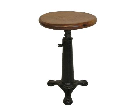 Early 20th Century Singer sewing machine stool having an adjustable circular beech top and standing on a tripod base, 35.5cm 