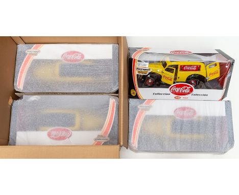 Matchbox: A trade box containing four 1:18 scale Ford Sedan Coca Cola Delivery Trucks, Matchbox/Mattel. (4)